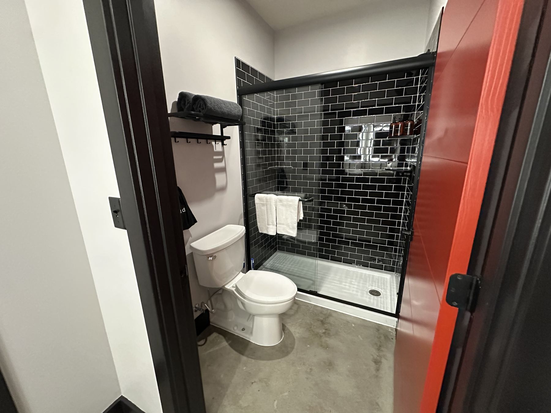 Suite bathroom with subway tile shower