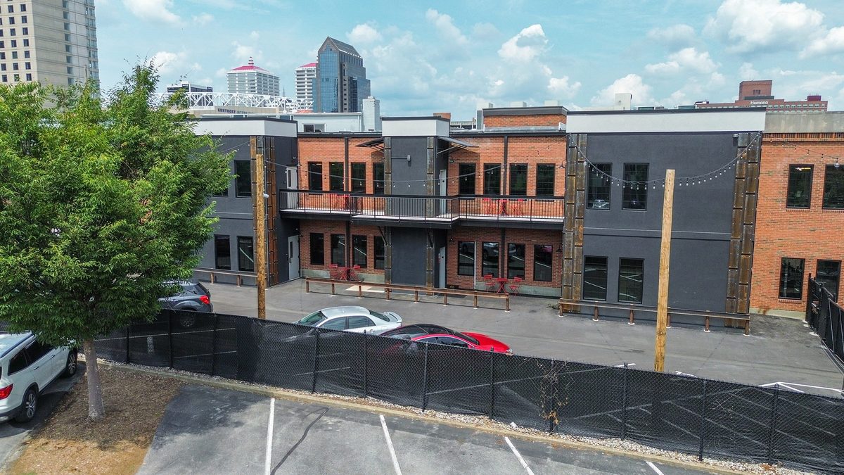 Aerial view of A12 Suites and the gated lot at 410 South First Street