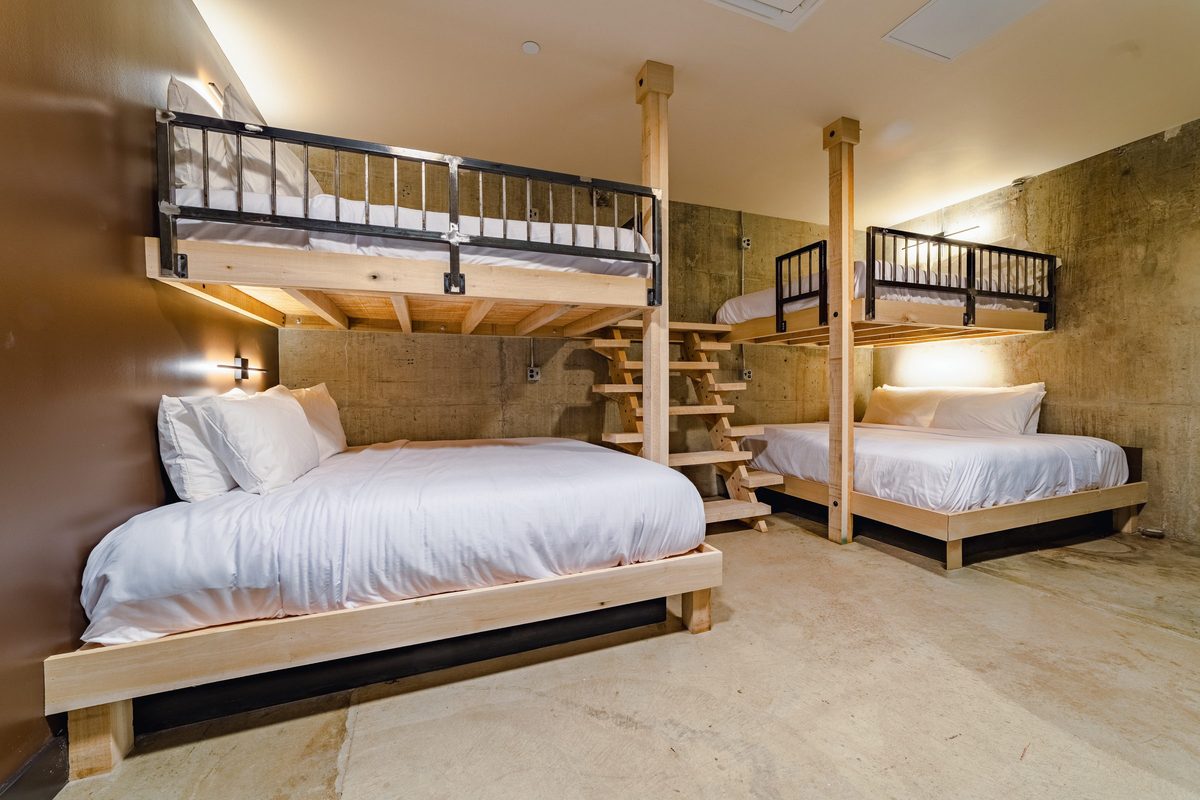 Queen over king bunk beds in a Maiden suite